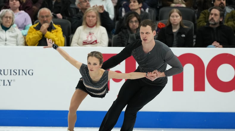 Alisa Efimova and Misha Mitrofanov compete during the pairs short program at the U.S. Figure Skating Championships, Wednesday, Jan. 7, 2026, in St. Louis. (AP Photo/Stephanie Scarbrough)