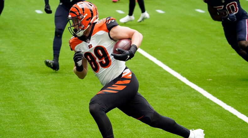 Cincinnati Bengals tight end Drew Sample (89) scores a touchdown after catching a pass against the Houston Texans during the first half of an NFL football game Sunday, Dec. 27, 2020, in Houston. (AP Photo/Sam Craft)