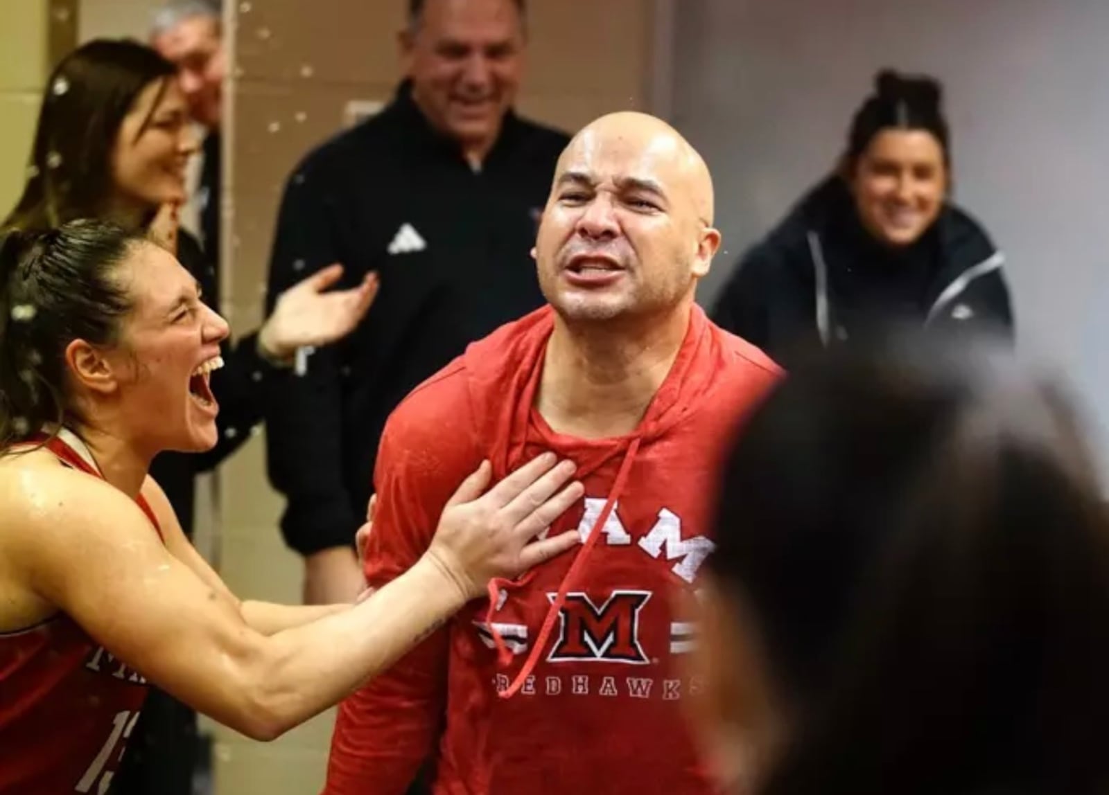 Miami women’s basketball coach Glenn Box celebrates after his RedHawks beat Ball State on Saturday in Muncie, Indiana. MIAMI ATHLETICS PHOTO