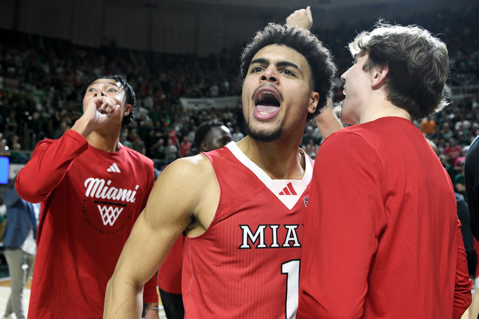 Miami (Ohio) guard Trey Perry reacts after defeating Ohio in an NCAA college basketball game, Friday, March 6, 2026, in Athens, Ohio. (AP Photo/HG Biggs)