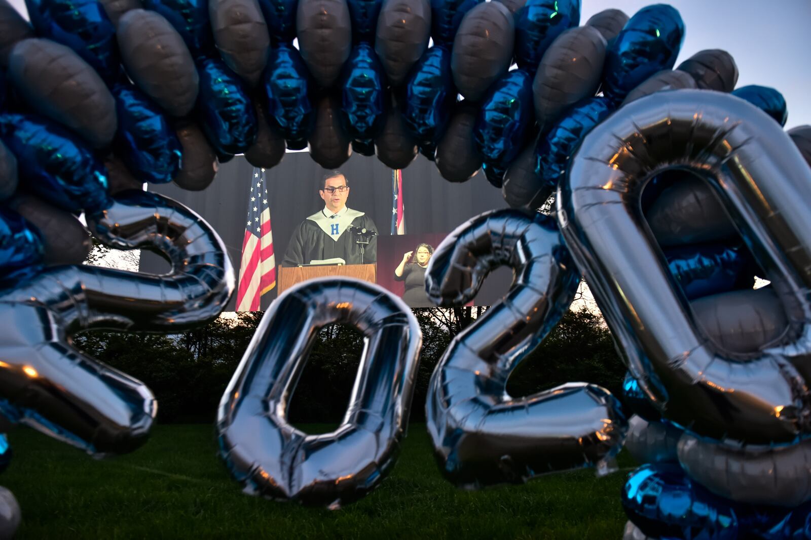 Hamilton High School graduates celebrated their commencement by viewing a pre-taped graduation ceremony at Holiday Auto Theatre drive-in Wednesday evening, May 20, 2020. Many schools have had to come up with uniuque ways to celebrate graduation while still adhering to social distancing guidelines during the coronavirus pandemic. NICK GRAHAM / STAFF