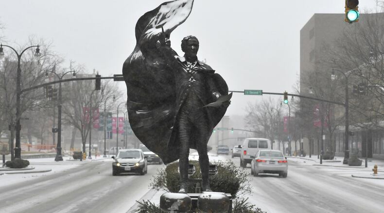The statue of Alexander Hamilton in a median on High Street in downtown Hamilton is a salute to the city’s namesake. MICHAEL D. PITMAN/STAFF