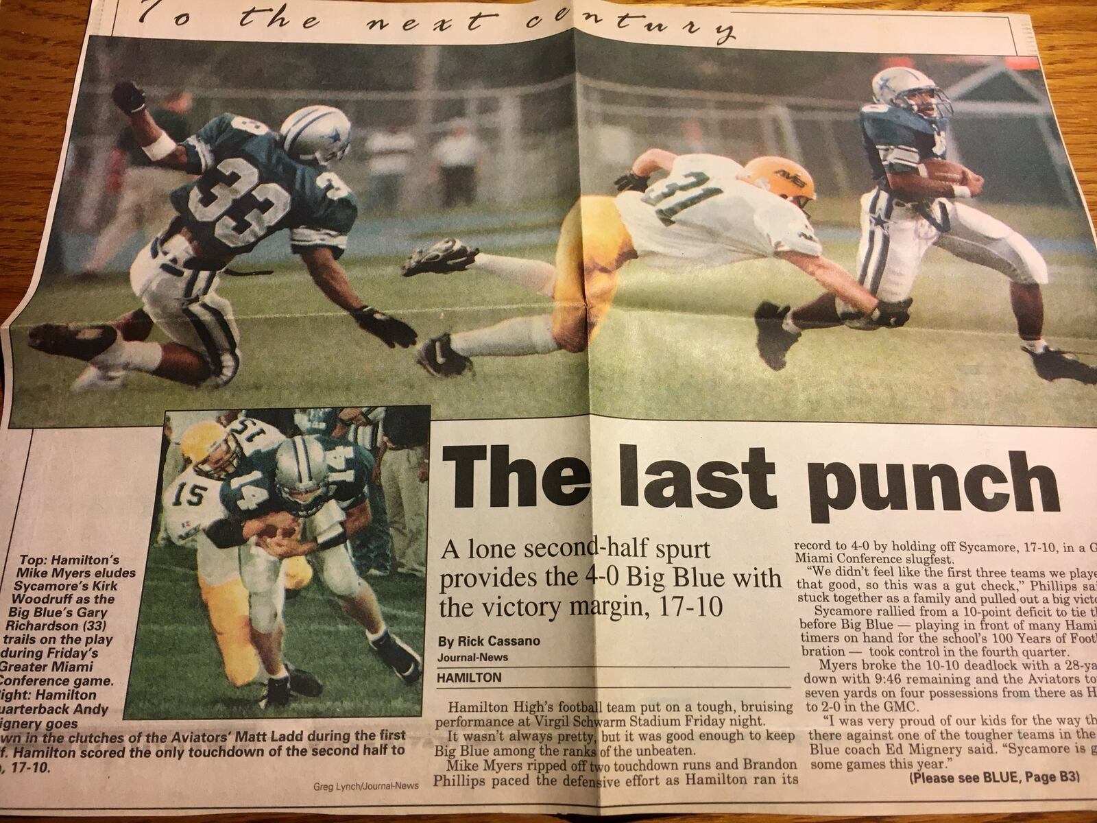 Top: Hamilton’s Mike Myers eludes Sycamore’s Kirk Woodruff during a Week 4 game at Virgil Schwarm Stadium in 1997. Bottom: Hamilton quarterback Andy Mignery goes down in the clutches of the Aviators’ Matt Ladd. GREG LYNCH/STAFF