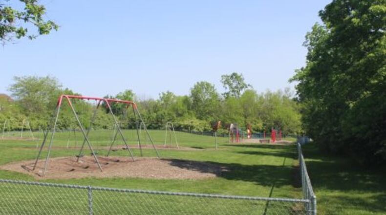 The colorful playground structure in the background of this photo will be torn down and replaced in July, but there are no plans to replace the equipment in this field area. Stephanie Pearson’s third-grade class and Kramer Elementary are working to raise money to fill this space.
KAYLEE OLMSTED/OXFORD OBSERVER