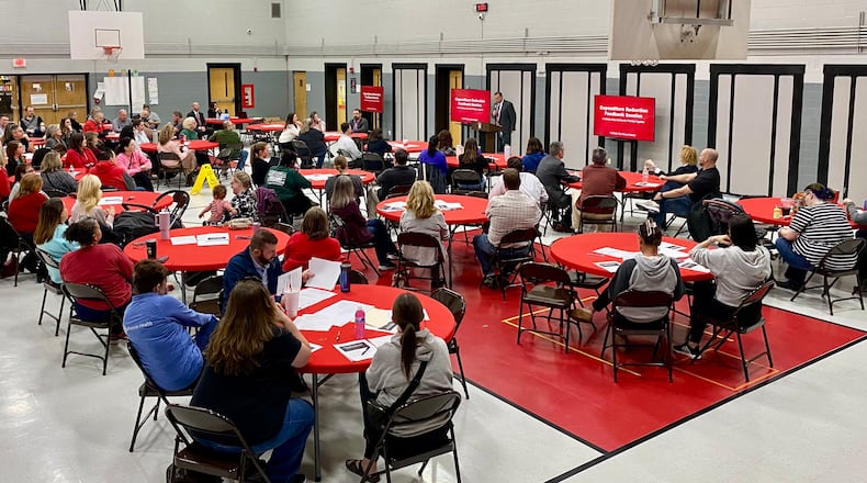 Fairfield school officials conducted a public forum Wednesday evening and asked nearly 100 attendees to share their budget cut priorities should a proposed earned income tax on the May ballot fail.
The “Expenditure Reduction Feedback Session” at Fairfield North Elementary drew nearly 100 residents, many of them school parents, and included breaking down into small group discussions on possible program and personnel cuts if voters reject a 1.25% earned income tax on the May 5 ballot. (Photo By Michael D. Clark/Journal-News Contributor)