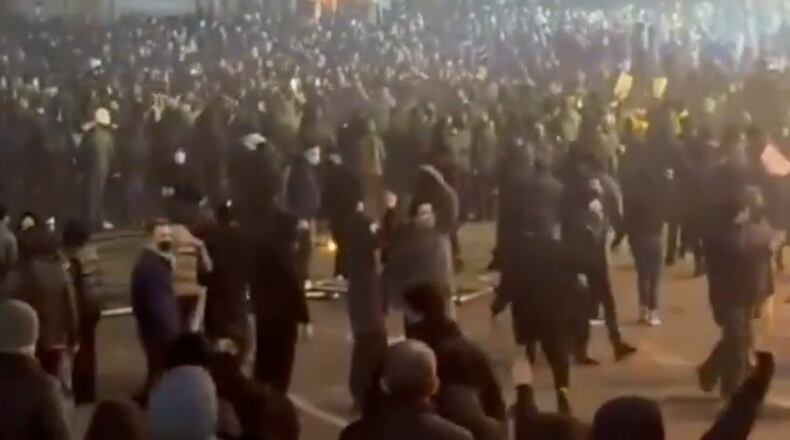In this frame grab from video taken by an individual not employed by The Associated Press and obtained by the AP outside Iran shows people during a protest in Tehran, Iran, Friday, Jan. 9, 2026. (UGC via AP)