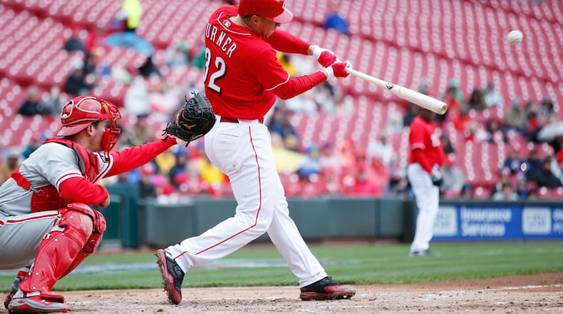 CINCINNATI, OH - APRIL 06: Stuart Turner #32 of the Cincinnati Reds drives in a run with a sacrifice fly in the fourth inning of the game against the Philadelphia Phillies at Great American Ball Park on April 6, 2017 in Cincinnati, Ohio. The Reds defeated the Phillies 7-4. (Photo by Joe Robbins/Getty Images)