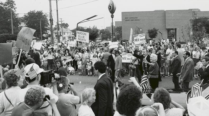 George and Barbara bush wave at their supporters in West Carrollton in August, 1988.