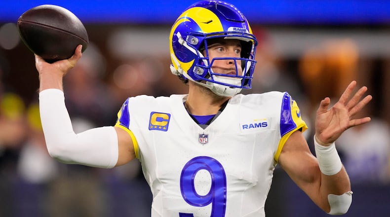 Los Angeles Rams quarterback Matthew Stafford passes against the Tampa Bay Buccaneers during the first half of an NFL football game, Sunday, Nov. 23, 2025, in Inglewood, Calif. (AP Photo/Mark J. Terrill)