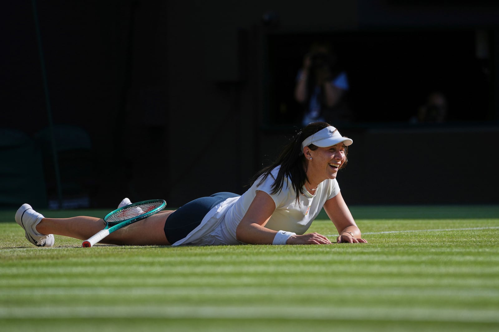 Amanda Anisimova of the U.S. celebrates winning the women's singles quarter finals match against Anastasia Pavlyuchenkova of Russia at the Wimbledon Tennis Championships in London, Tuesday, July 8, 2025.(AP Photo/Kin Cheung)