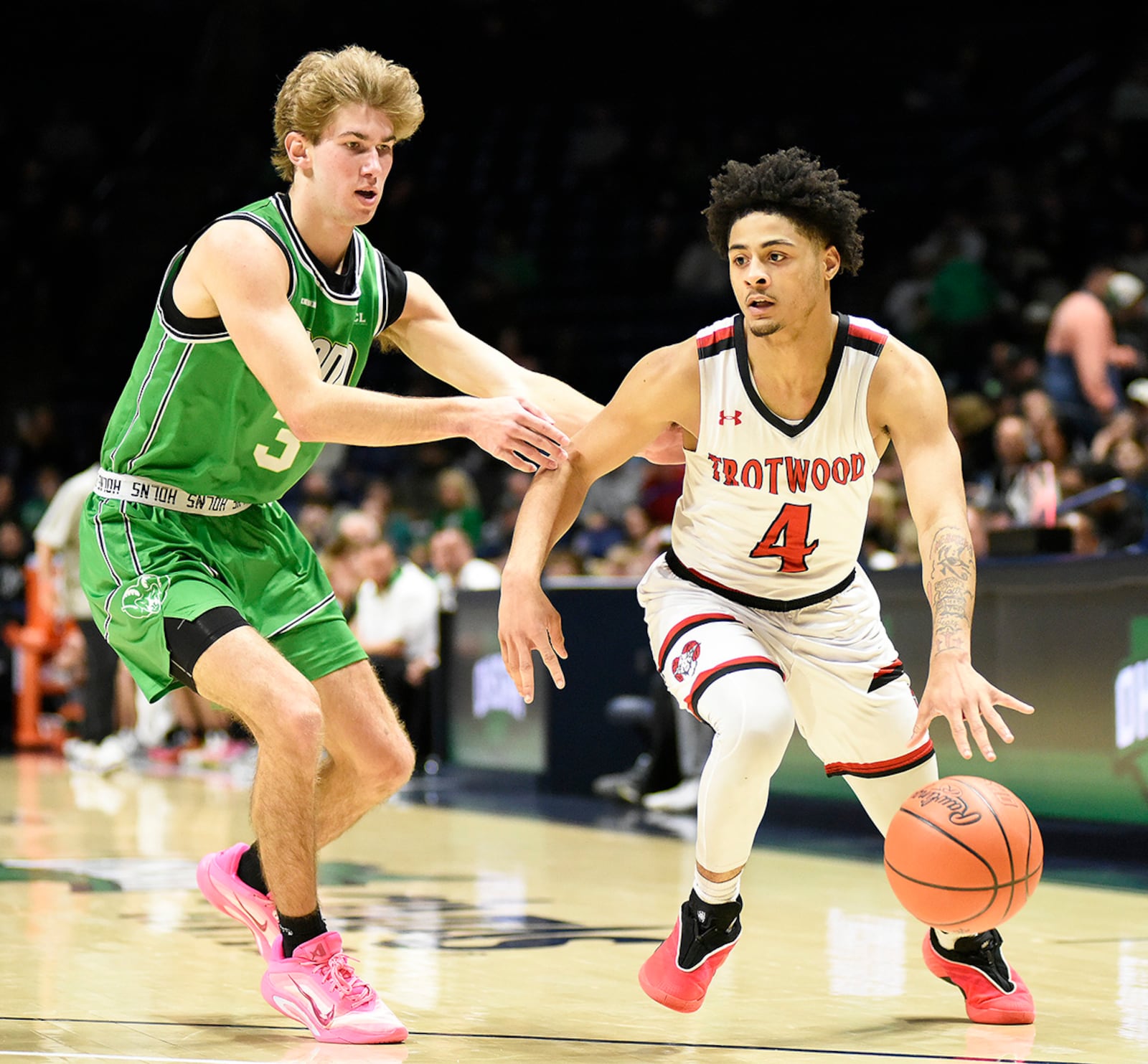 Trotwood-Madison's Daveon Arnold drives to the basket during their 54-48 victory on Hamilton Badin in the Division III, Region 12 championship game on Saturday, March 14, 2026, at Xavier University's Cintas Center. GEOFF NEVILLE / CONTRIBUTED PHOTO