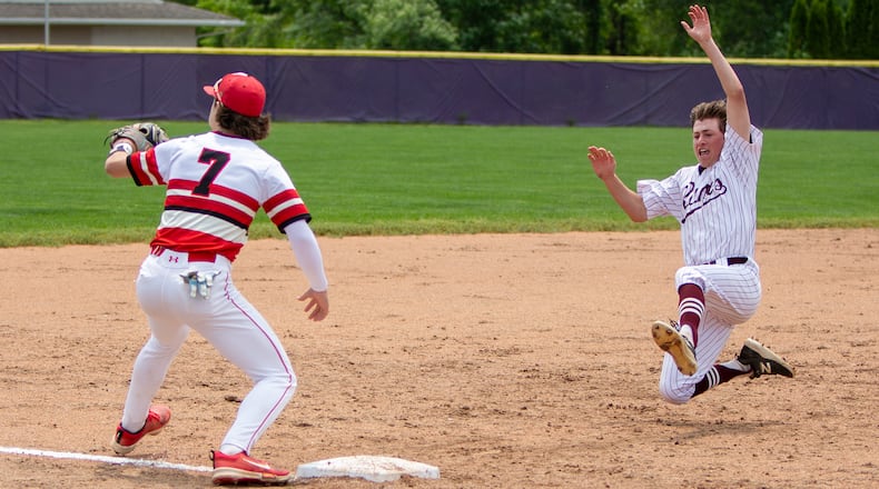 Ross' Griffin Mueller slides safely into third during the Rams' five-run second inning in Saturday's Division III district title win at Bellbrook High School. Jeff Gilbert/CONTRIBUTED
