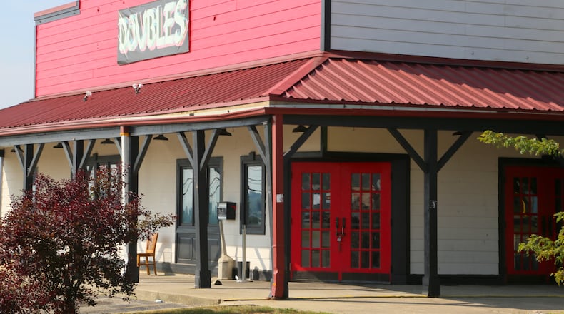 The operators of Doubles Bar in Hamilton have been evicted by the property owners. The Louisville, Ky.-based owners of the property at 1555 Main St. said they plan to tear down the building and sell the 1.34-acre property, perhaps to a regional or national restaurant chain. GREG LYNCH/STAFF