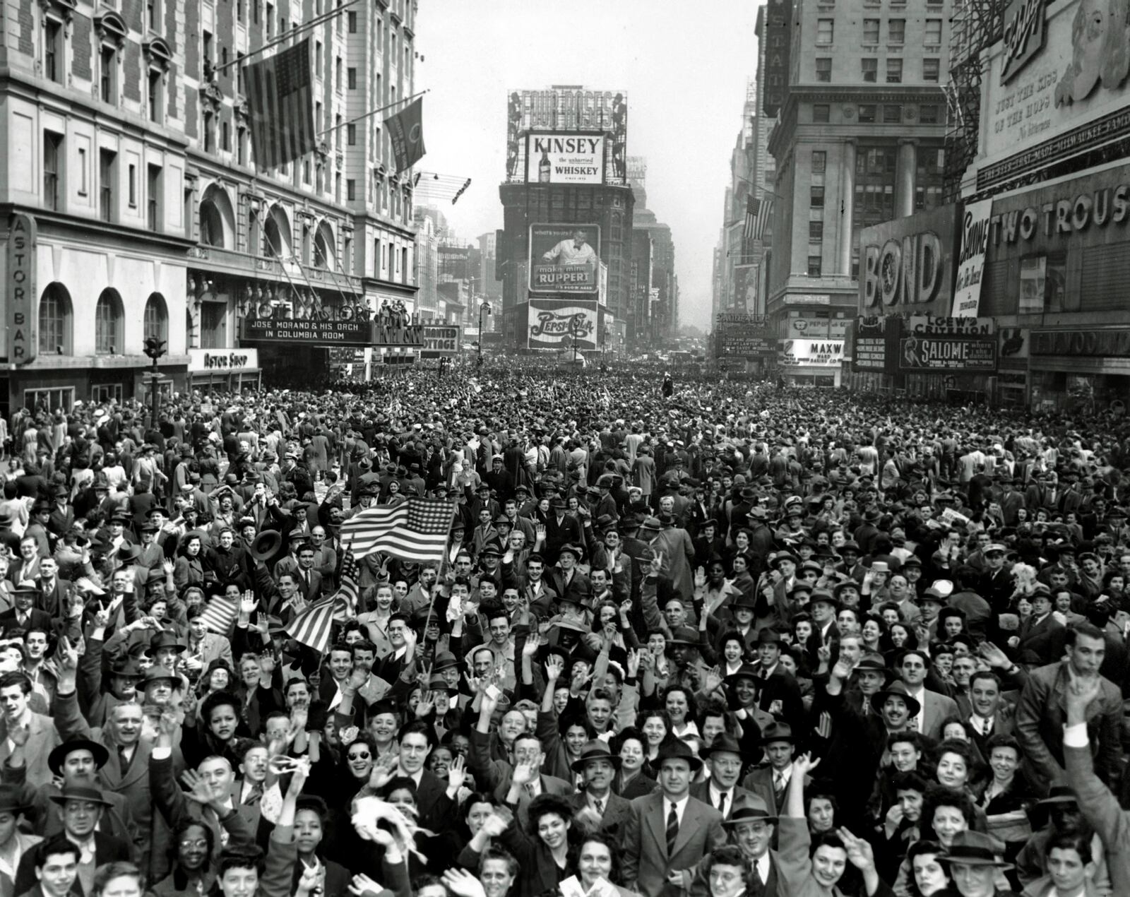 FILE - Looking north from 44th Street, New York's Times Square is packed Monday, May 7, 1945, with crowds celebrating the news of Germany's unconditional surrender in World War II. (AP Photo/Tom Fitzsimmons, File)
