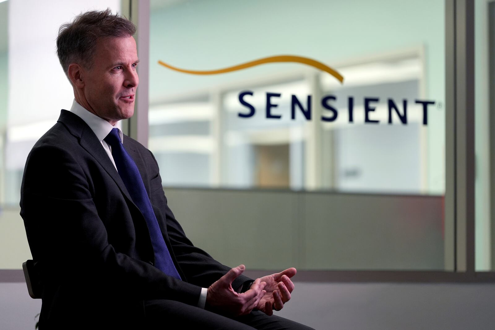 Sensient Technologies CEO Paul Manning speaks during an interview at a production facility for the color additive manufacturing company, in St. Louis., on Wednesday, April 2, 2025. (AP Photo/Jeff Roberson)