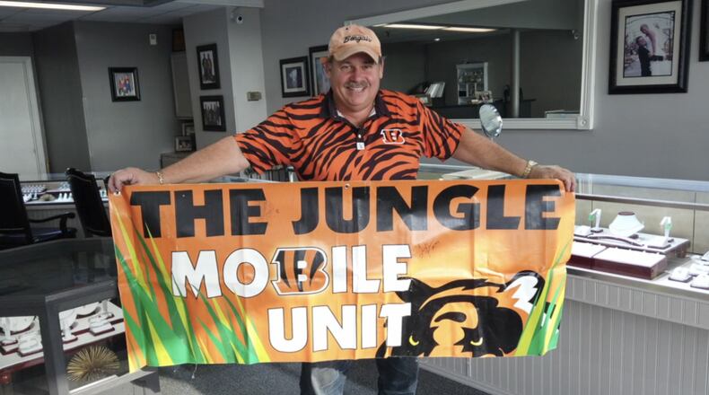 A Ross resident, who is an area businessman, and his wife are using what may be the Cincinnati Bengals’ second consecutive Super Bowl run this season to raise charity money through a game ticket and trip package. Among the causes they hope to support with the Super Bowl raffle is Ross High School athletics. Phil Amrein - pictured in his store - and his wife Shelley have lived in the Ross school community for more than three decades. (Photo by WCPO-TV\Journal-News)
