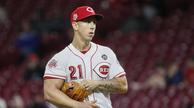 Cincinnati Reds relief pitcher Michael Lorenzen in the sixth inning of a baseball game after giving up a three-run home run to Milwaukee Brewers’ Orlando Arcia, Tuesday, April 2, 2019, in Cincinnati. (AP Photo/John Minchillo)