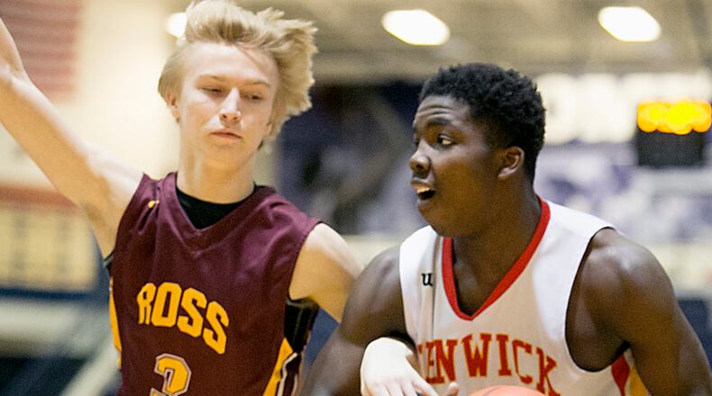 Fenwick guard Caleb Davis is covered by Ross guard Dylan Zimmerman during the All-Butler County All-Star boys basketball game at the Hamilton Athletic Center in Hamilton on April 7, 2018. CONTRIBUTED PHOTO BY E.L. HUBBARD