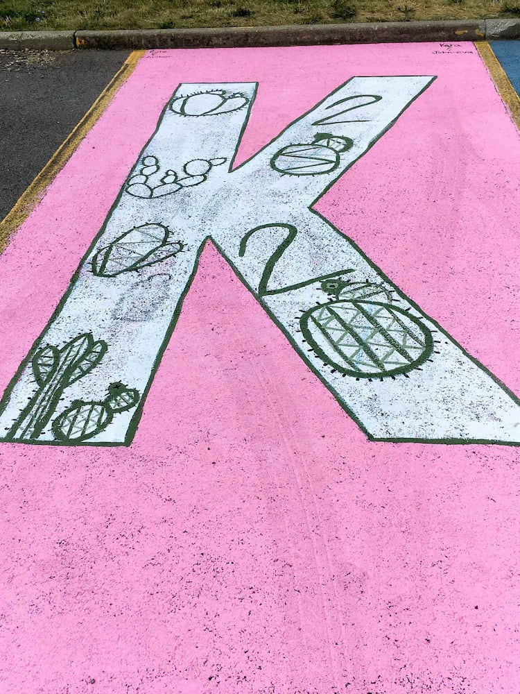 PHOTOS Lakota East seniors paint parking spots