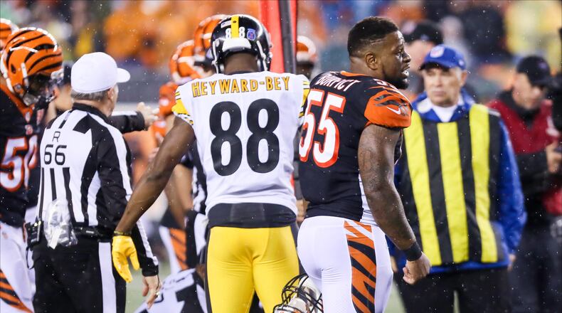 Bengals linebacker Vontaze Burfict (55) talks to other players during their game against the Steelers at Paul Brown Stadium, Monday, Dec. 4, 2017. GREG LYNCH / STAFF