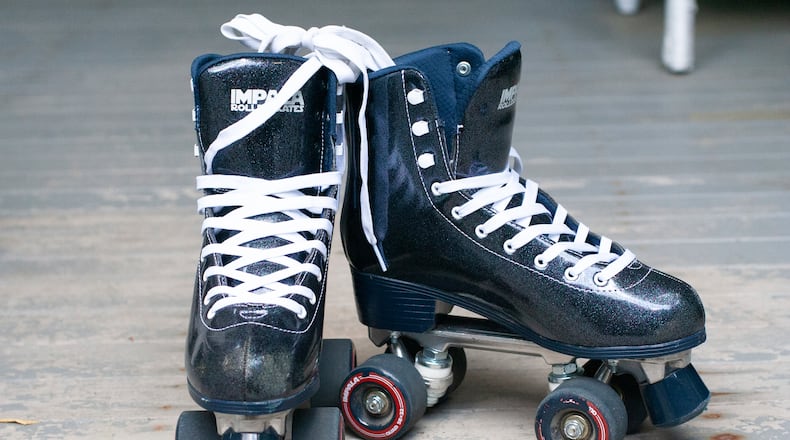 Some are asking Cincinnati leaders and those in charge of redevelopment plans for a recreation center in Over-the-Rhine to include a roller rink. AP FILE