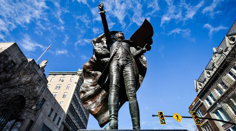 Alexander Hamilton, the city of Hamilton's namesake, stands in the city's downtown, welcoming travelers and pedestrians on High Street. NICK GRAHAM/FILE