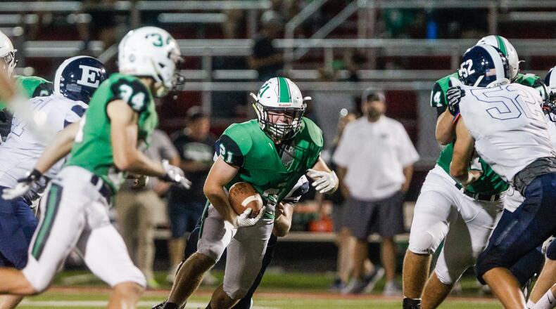 Badin's Dallas Rawlings carries the ball during the second half of their football game against Edgewood Friday, Sept. 13, 2019 at Fairfield stadium in Fairfield. NICK GRAHAM/STAFF