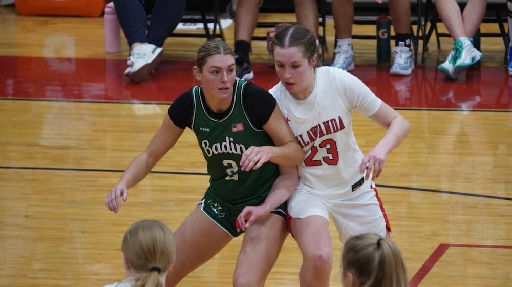 Badin’s Braelyn Even boxes out Talawanda’s Janna Cary during a free-throw attempt on Monday night at Talawanda. CHRIS VOGT / CONTRIBUTED