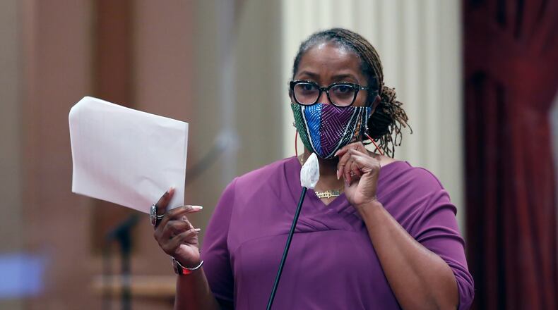 FILE - In this June 25, 2020, file photo, State Sen. Holly Mitchell, D-Los Angeles, chair of the Senate Budget and Fiscal Review Committee, discusses one of the more than one dozen budget trailer bills before the Senate at the Capitol in Sacramento, Calif. California lawmakers are setting up a task force to study and make recommendations for reparations to African-Americans, particularly the descendants of slaves, as the nation struggles again with civil rights and unrest following the latest shooting of a Black man by police. The state Senate supported creating the nine-member commission on a bipartisan 33-3 vote Saturday, Aug. 29, 2020. (AP Photo/Rich Pedroncelli, File)
