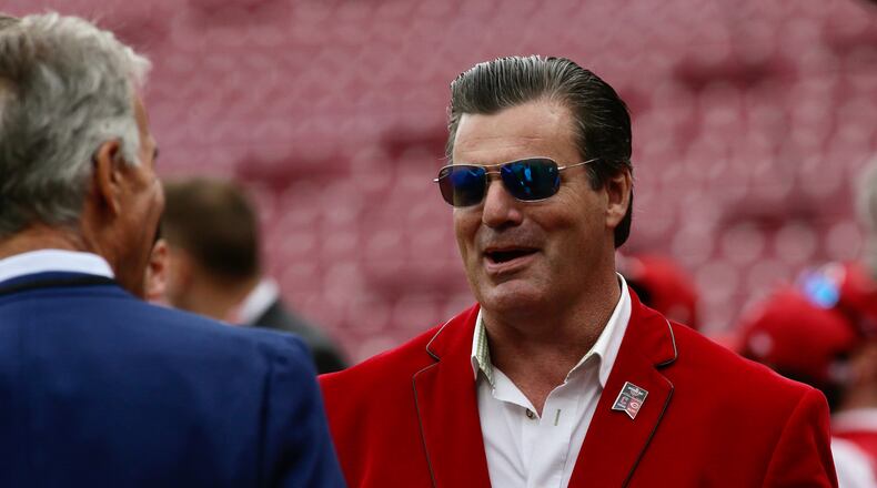 Phil Castellini, of the Reds, talks to Chris Welsh on Opening Day on April 12, 2022, at Great American Ball Park in Cincinnati. David Jablonski/Staff