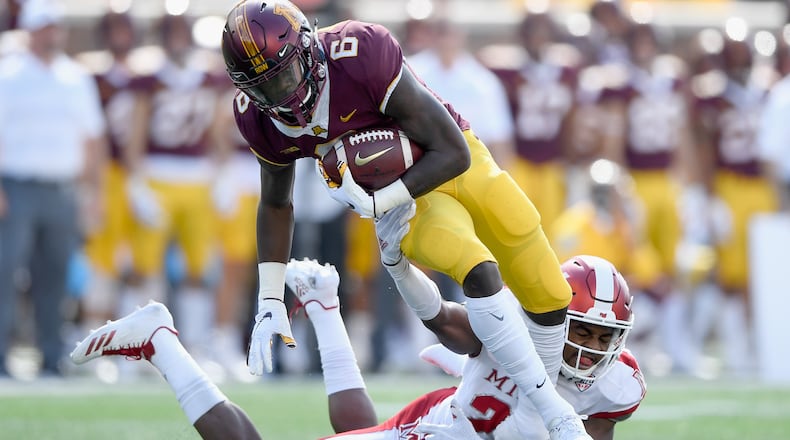Miami’s De’Andre Montgomery tackles Minnesota’s Tyler Johnson during the first quarter of the game on September 15, 2018 at TCF Bank Stadium in Minneapolis, Minnesota. (Photo by Hannah Foslien/Getty Images)