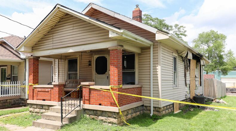 Two people were killed and a firefighter was injured in an early morning house fire Sunday in Middletown in the 1800 block of Clarendon Avenue. BRYANT BILLING / STAFF