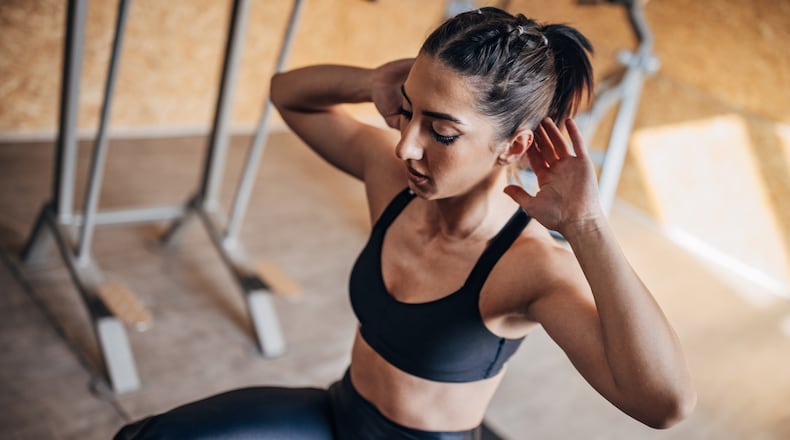 The seated ab crunch provides a safer alternative for targeting the abs and low back and it can be conveniently performed at home, office or anywhere a chair, bench or other study surface is available. iSTOCK