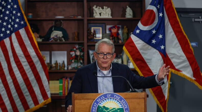 Gov. Mike DeWine speaks at a press conference about the current needs of Springfield on Friday, July 25, 2025, at St. Vincent de Paul. The governor and the rest of the Ohio Redistricting Commission will convene for the first time on Tuesday, Oct. 21 — just 10 days before an end-of-the-month deadline for the commission to pass a bipartisan congressional redistricting update. JOSEPH COOKE/STAFF