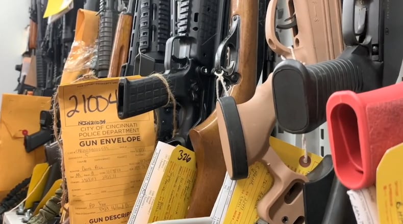 Cincinnati City Council passed two gun laws addressing the safe storage and possession of firearms, but amendments to Ohio’s Revised Code have a preemption law that prevents local governments from regulating guns. Seen here are guns confiscated by the Cincinnati Police Dept. CONTRIBUTED/WCPO