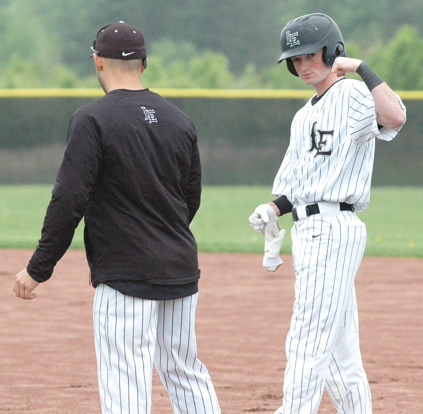Lakota East’s Preston Dorsey reacts after a fifth-inning single Saturday afternoon during a Greater Miami Conference baseball game against visiting Lakota West in Liberty Township. West won 5-3 in nine innings. RICK CASSANO/STAFF