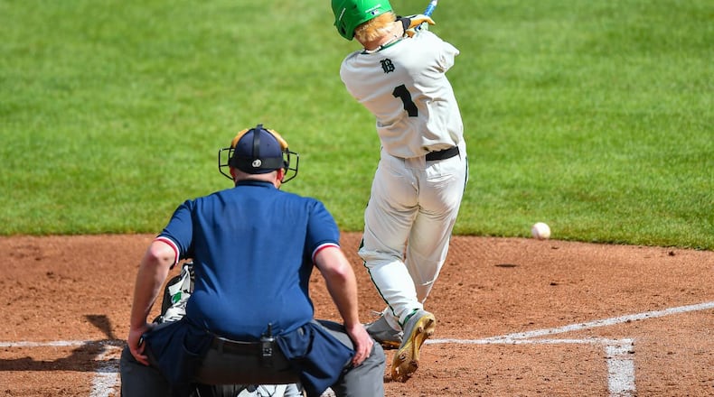 Badin's Chase Luebbe connects on a hit against West Branch in the Division II state final on Sunday at Akron's Canal Park. Kyle Hendrix/CONTRIBUTED