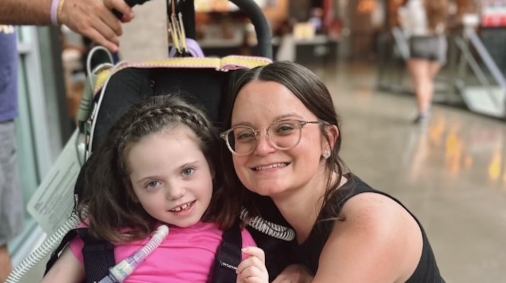 Megan Wright is seen here in summer 2025 with her daughter Lexi, who has a rare and severe form of epilepsy called KCNT1. CONTRIBUTED