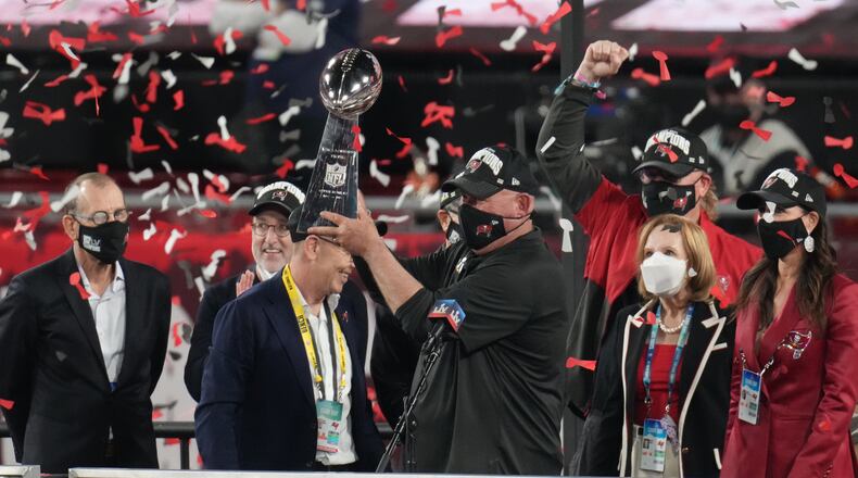 Tampa Bay Buccaneers head coach Bruce Arians holds the Vince Lombardi Trophy after winning Super Bowl LV at Raymond James Stadium in Tampa, Fla., Feb. 7, 2021. The Buccaneers won the Super Bowl, defeating the Kansas City Chiefs, 31-9. (Chang W. Lee/The New York Times)