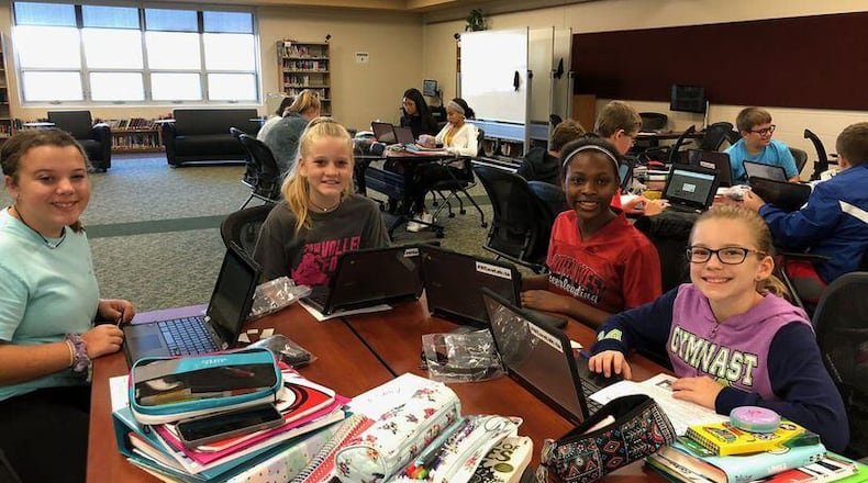 For the first time in the history of Lakota Schools, all students, regardless of grade level, are now getting part of their classroom instruction via learning laptops. The digital milestone was recently announced by Lakota officials and it marks the finalization of a multi-year effort, which began in 2018, pictured are Lakota students that school year, to provide free laptop access to all 17,800 students in Butler County’s largest school system. FILE PHOTO