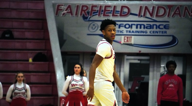 Fairfield's Daviawne Crim turns to survey the court after making bucket against Lakota West on Tuesday night at Fairfield Arena. Chris Vogt/CONTRIBUTED