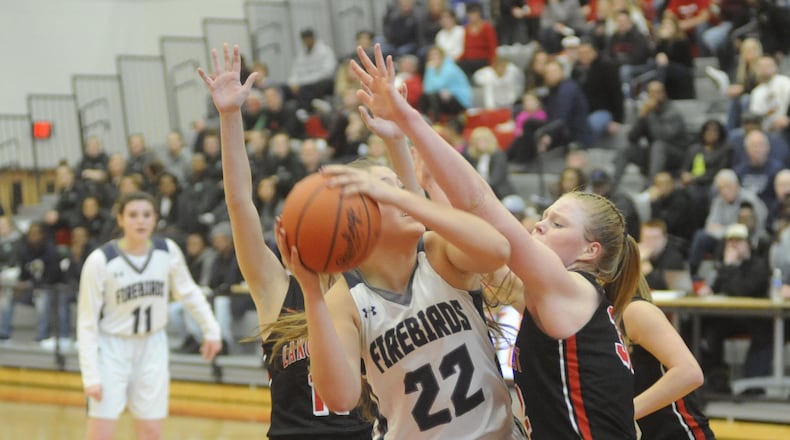 Lakota West’s Abby Prohaska (right) pressures Madison Bartley (with ball) of Fairmont on Saturday afternoon during a Division I district final at Princeton. MARC PENDLETON/STAFF