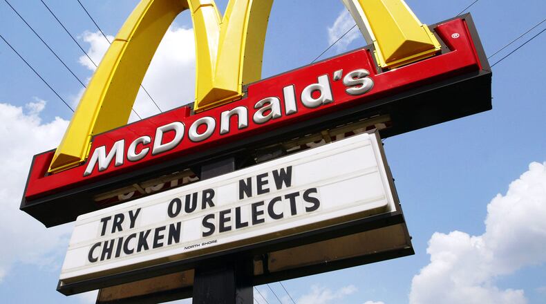 NILES, IL - JULY 28: A McDonald's sign promotes new Chicken Selects stands near a store July 28, 2004 in Niles, Illinois. McDonald's has introduced new Chicken Selects premium breast strips as way of targeting consumers eating more white-meat chicken.  (Photo by Tim Boyle/Getty Images)