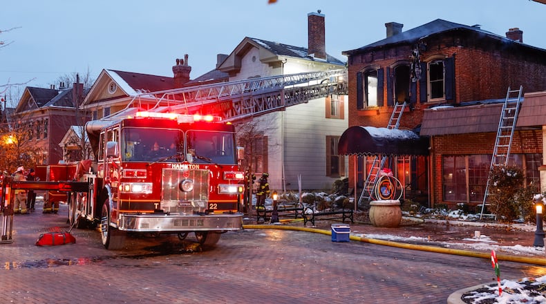 Hamilton firefighters extinguished a blaze in the 300 block of North Third Street in the German Village Friday morning, Dec. 5, 2025. NICK GRAHAM/STAFF