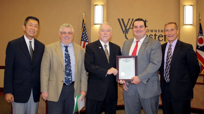 Pictured here are Trustee Lee Wong; Ken Keim, director, Finance & Information Technology; Fiscal Officer Bruce Jones; Ryan Holiday, southwest regional liaison for Ohio Auditor of State Dave Yost; Trustee Mark Welch, after the township was presented the state auditor’s award.