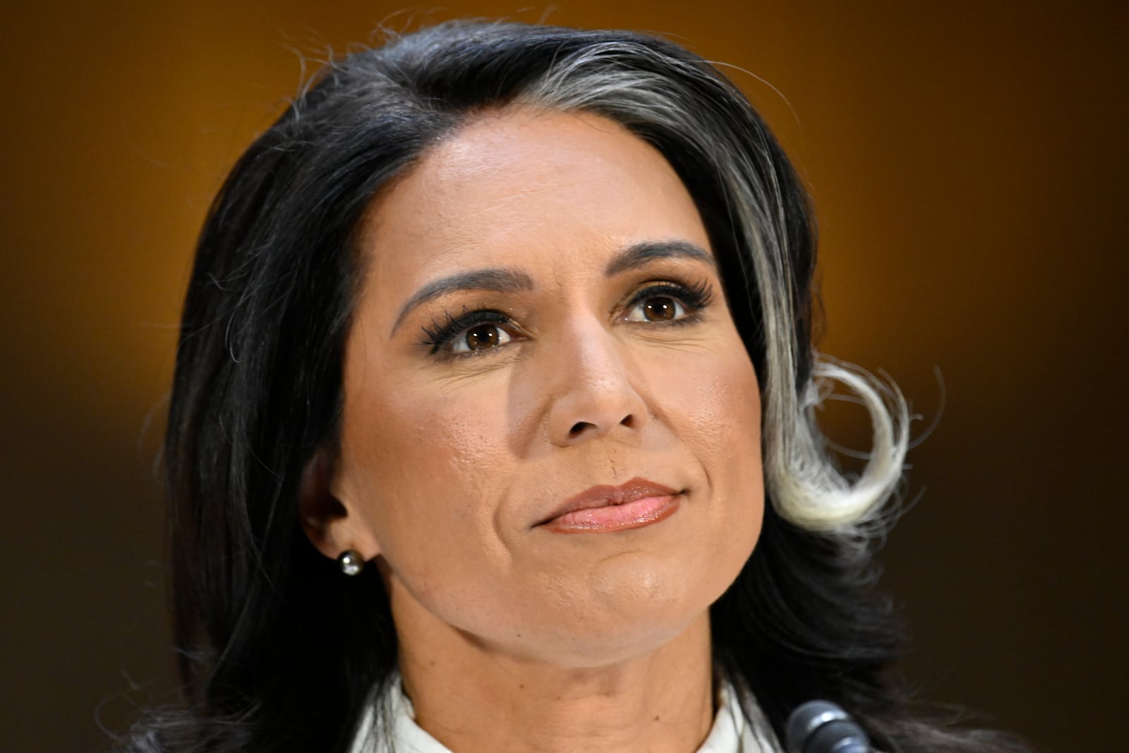 Tulsi Gabbard, President Donald Trump's choice to be the Director of National Intelligence, arrives to appear before the Senate Intelligence Committee for her confirmation hearing on Capitol Hill Thursday, Jan. 30, 2025, in Washington. (AP Photo/John McDonnell)
