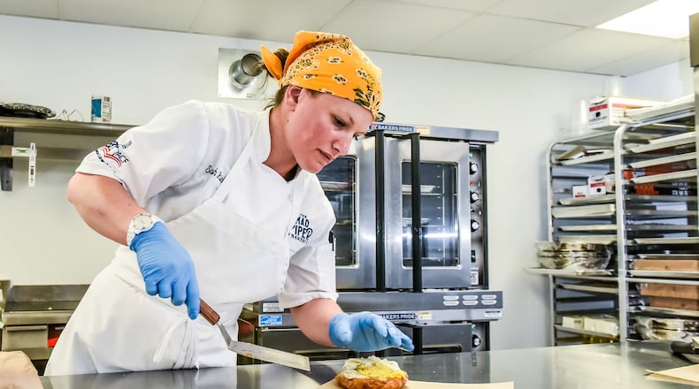 Sarah Rieke recently opened The Mad Piper Bakery on Hamilton Cleves Road in Ross Township. She had planned to open in March but opening was postponed due to COVID-19 pandemic. The Mad Piper now has the drive-thru open for bakery items and breakfast sandwiches, coffee and more. NICK GRAHAM / STAFF