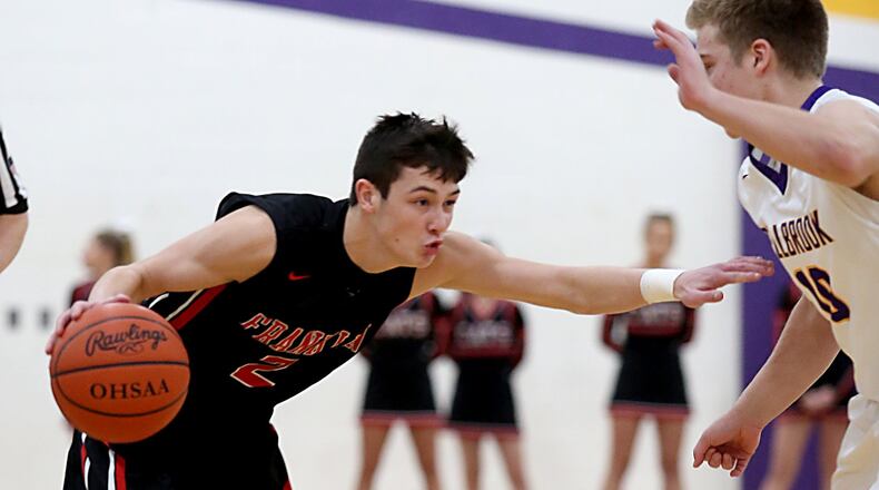 Franklin guard Payton Knott tries to drive on Bellbrook guard Ethan Savey during their game at Bellbrook on Dec. 16, 2016. COX MEDIA FILE PHOTO