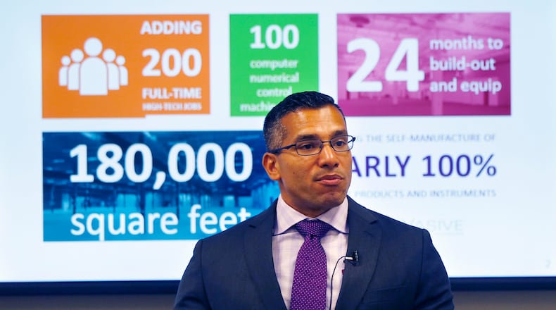 Nuvasive Senior Director of Manufacturing Operations Ruben Perez talked about the job impact of opening a new manufacturing facility in West Carrollton in 2016. TY GREENLEES / STAFF