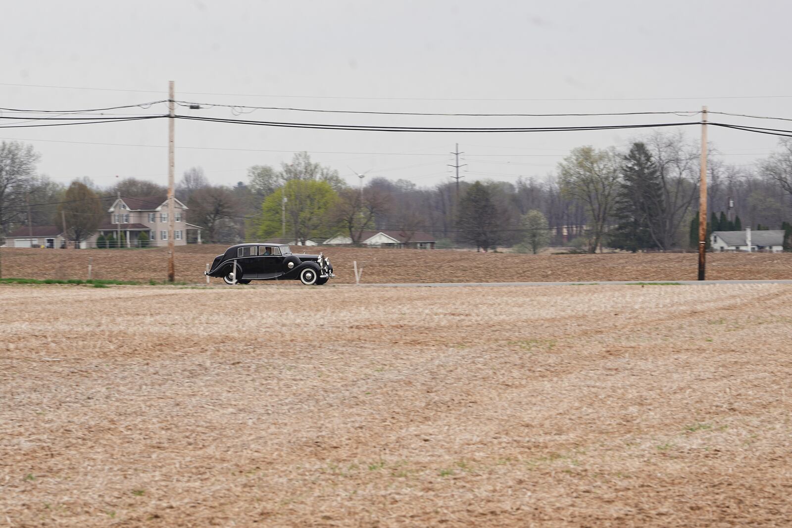 Mike Fowler drives a 1946 Rolls-Royce Silver Wraith from the The Rolls-Royce Foundation's collection in Mechanicsburg, Pa., Saturday, April 5, 2025. (AP Photo/Matt Rourke)